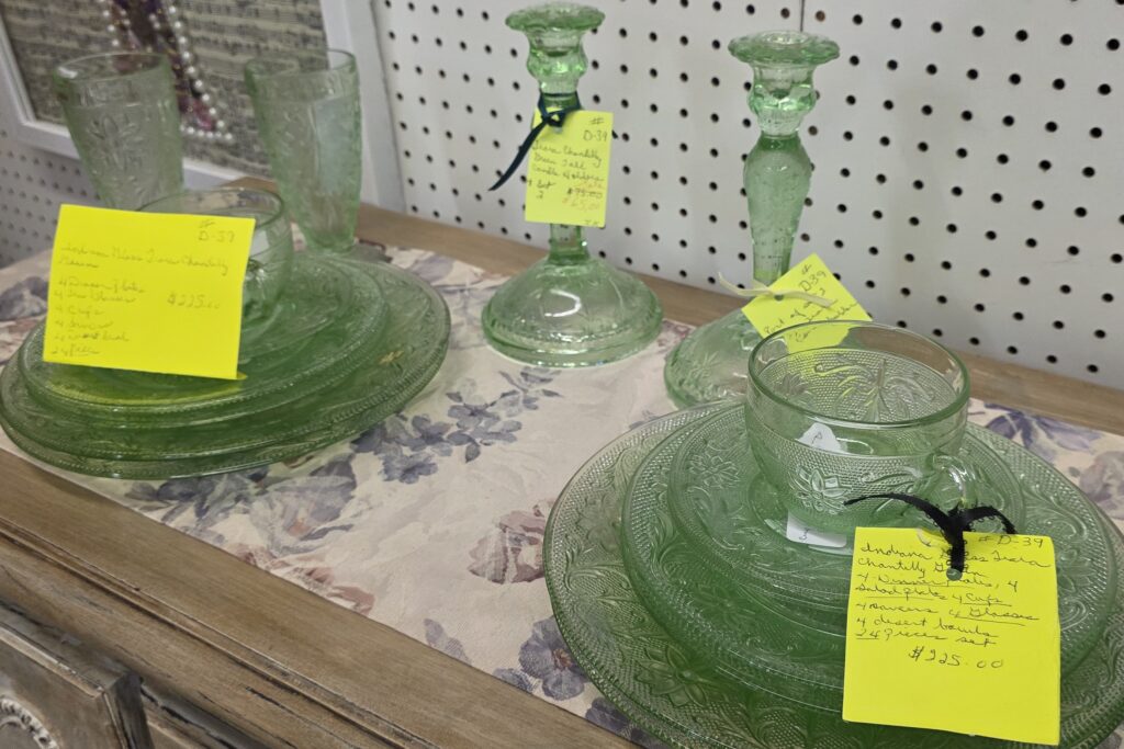 vintage items in antique mall booth with clear price tags